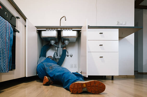 Professional Plumbing technician working in Tipton, IA